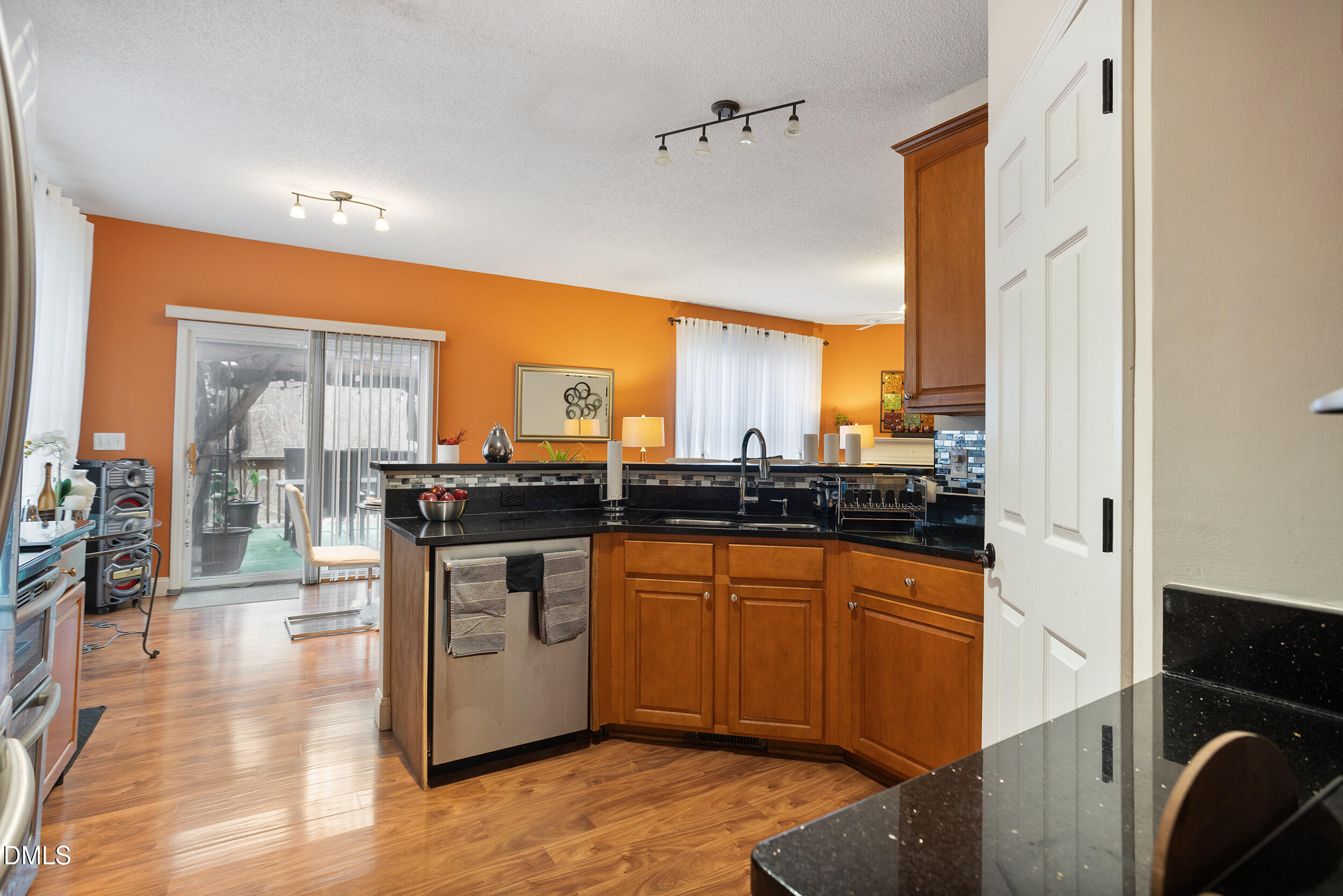 101 Cedar Key Landing Garner, NC 27529 - Photo 8 of 37 a kitchen with stainless steel appliances granite countertop a stove and a sink