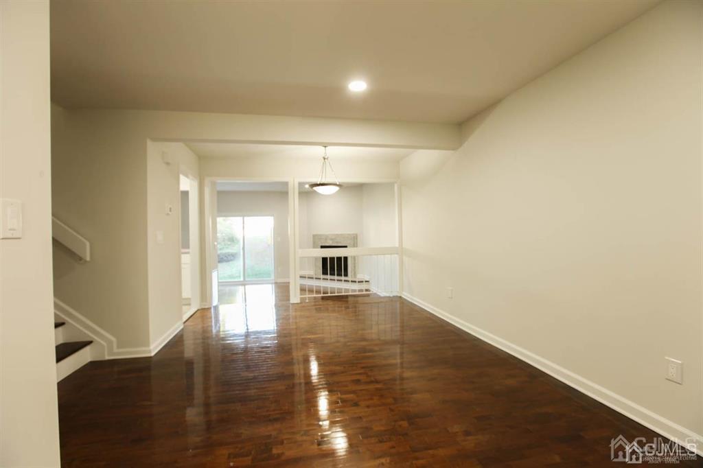 3203 Hana Road Edison, NJ 08817 - Photo 5 of 12 a view of empty room with wooden floor