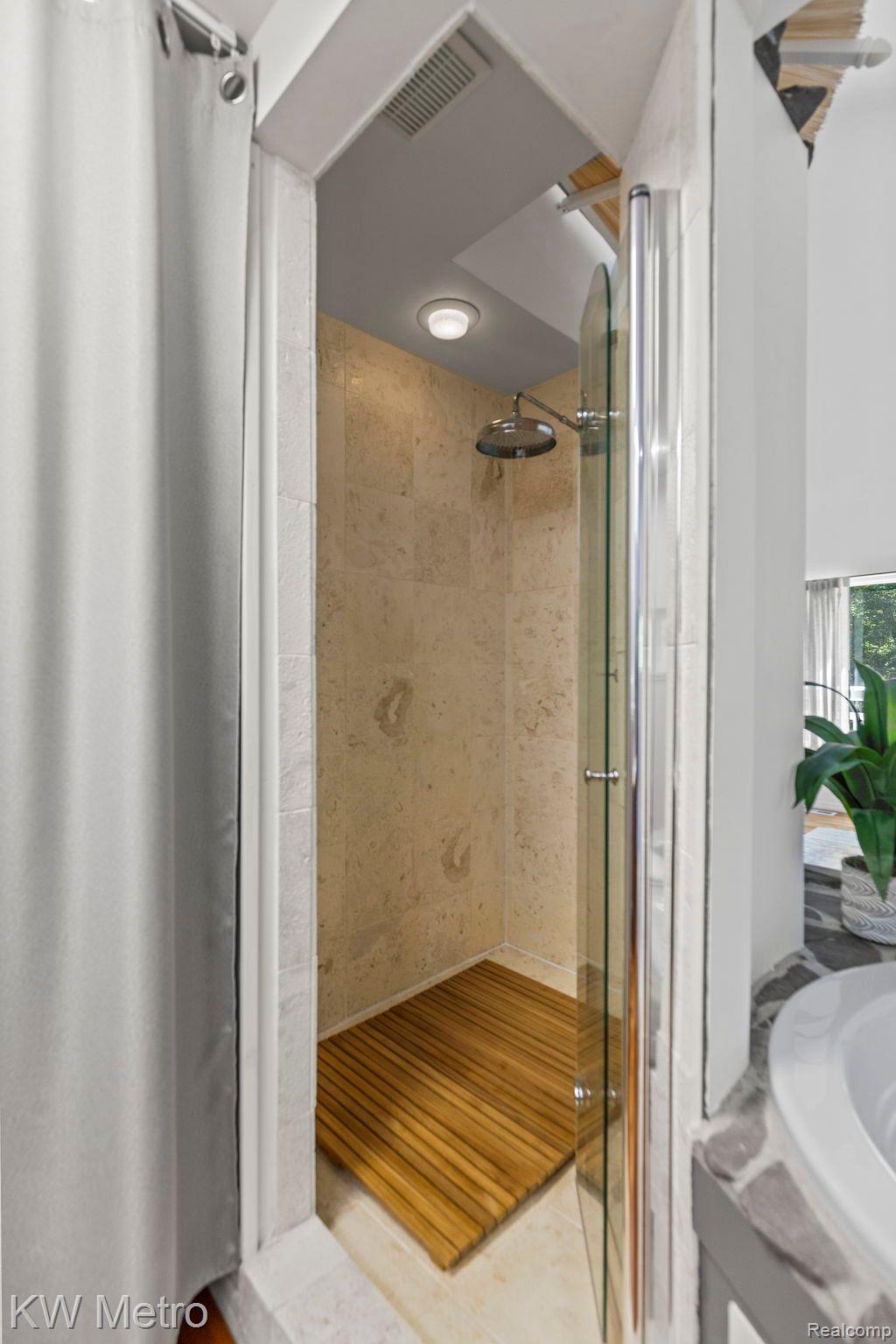 3205 Stanton Road Lake Orion, MI 48362 - Photo 34 of 60 Primary ensuite limestone shower
