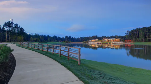 a view of a lake with a yard
