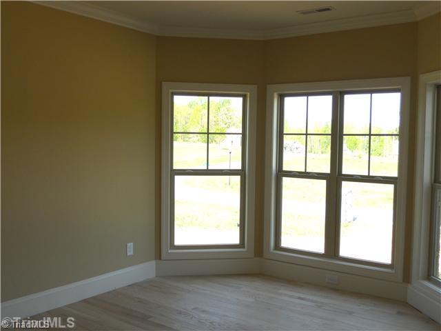 7506 Broadus Court Oak Ridge, NC 27310 - Photo 3 of 9 Living Room.