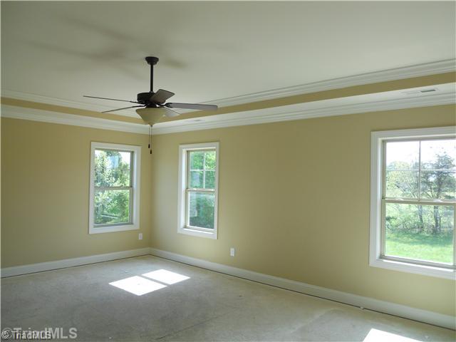 7506 Broadus Court Oak Ridge, NC 27310 - Photo 5 of 9 Master Bedroom.