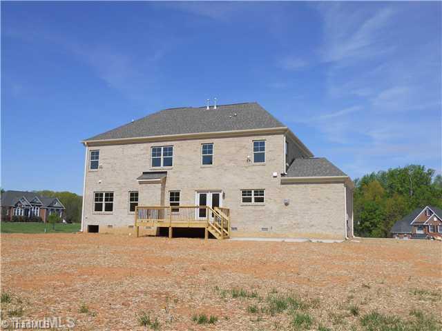 7506 Broadus Court Oak Ridge, NC 27310 - Photo 9 of 9 Exterior Back.