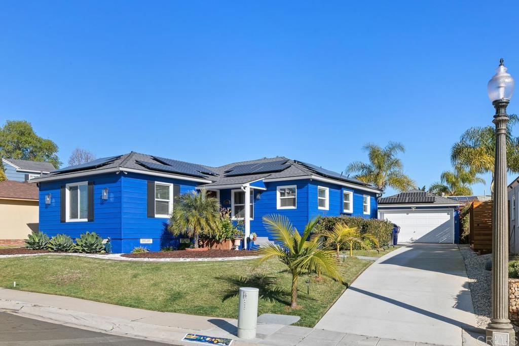 4845 Louise Drive San Diego, CA 92115 - Photo 1 of 29 a front view of a house with garden