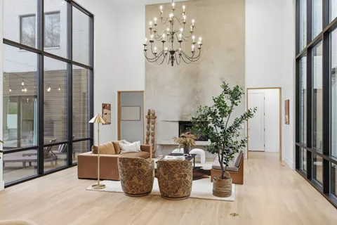 a view of a kitchen with a refrigerator and a sink