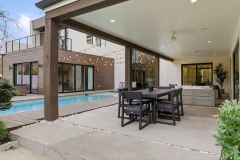 a outdoor living space with patio furniture and potted plant