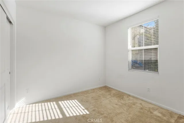 a bathroom with a sink a mirror and shower