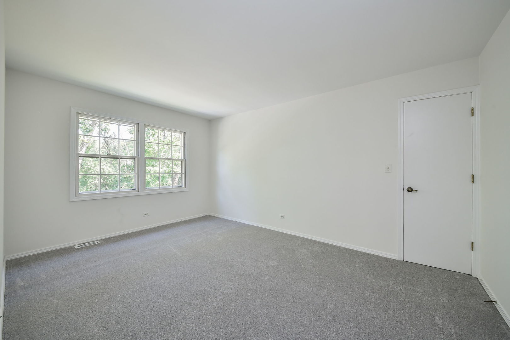 825 Biltmore Court Naperville, IL 60563 - Photo 20 of 43 an empty room with windows