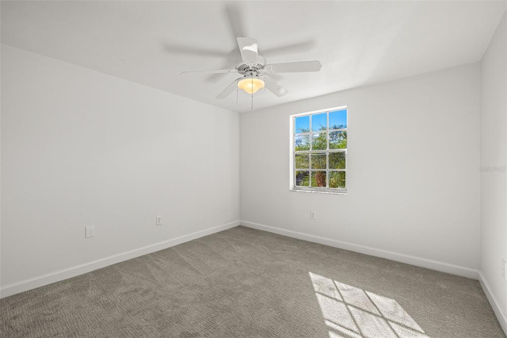 4324 Summersun Drive New Port Richey, FL 34652 - Photo 24 of 43 an empty room with a window