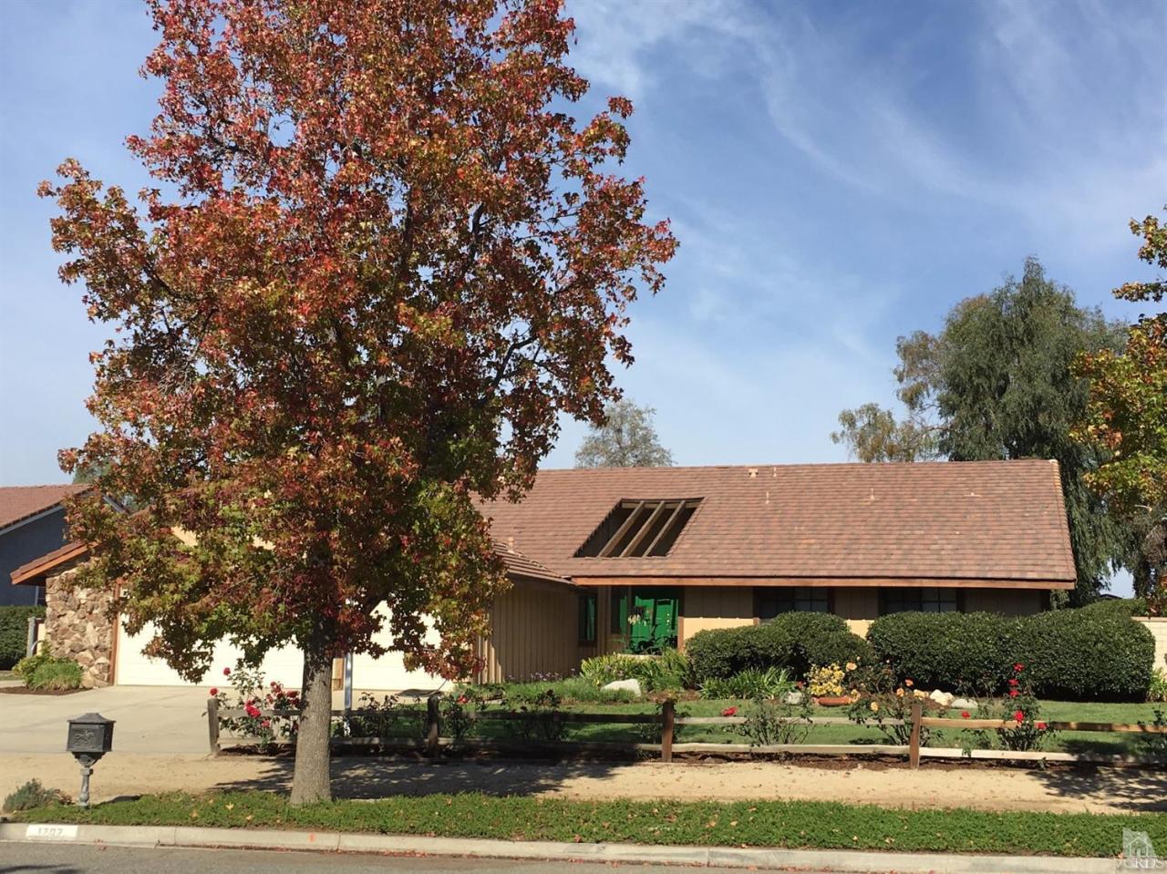 1707 Rambling Road Simi Valley, CA 93065 - Photo 1 of 29 a front view of a house with garden
