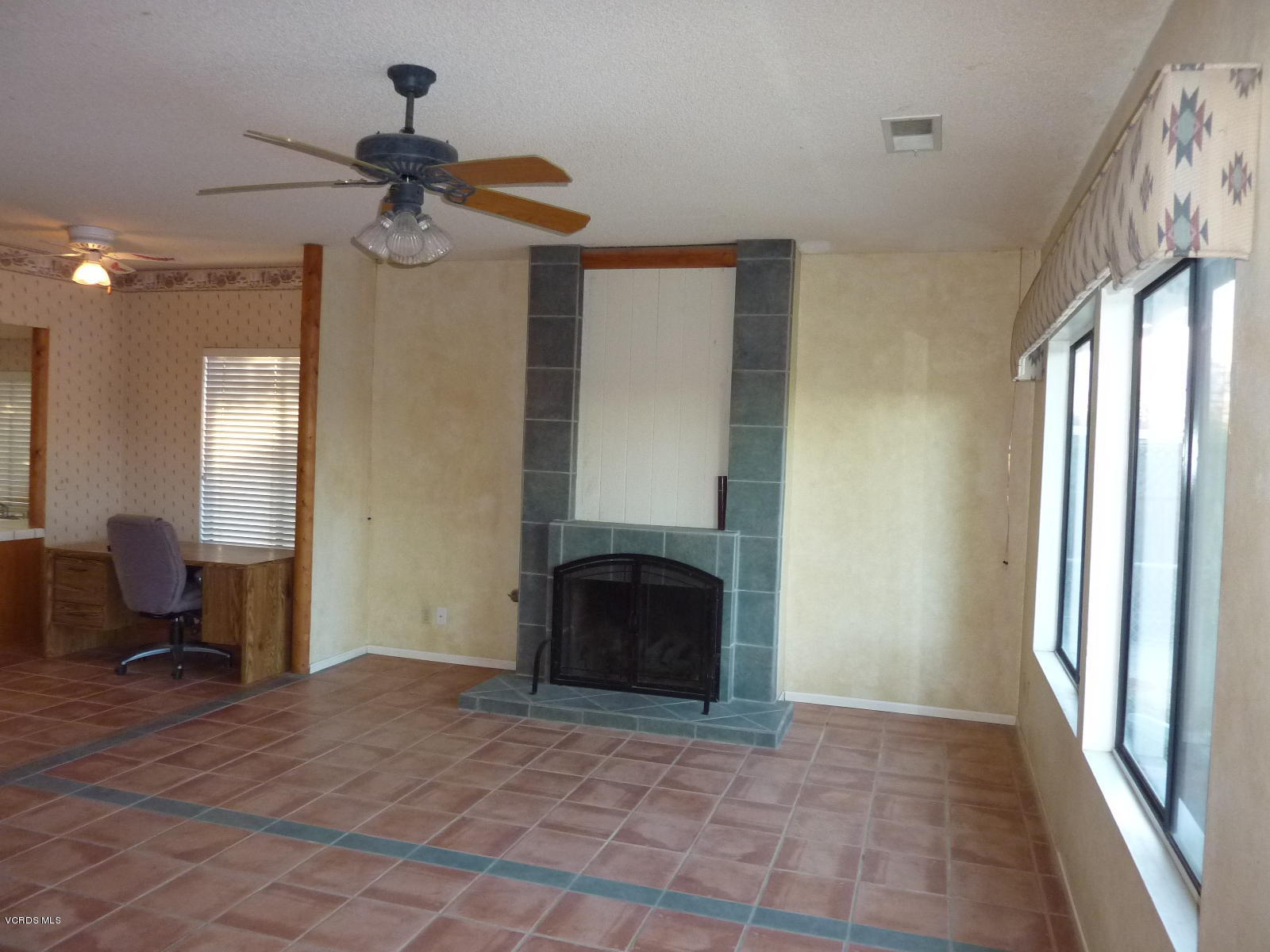 1707 Rambling Road Simi Valley, CA 93065 - Photo 15 of 29 a view of a livingroom with furniture and a window