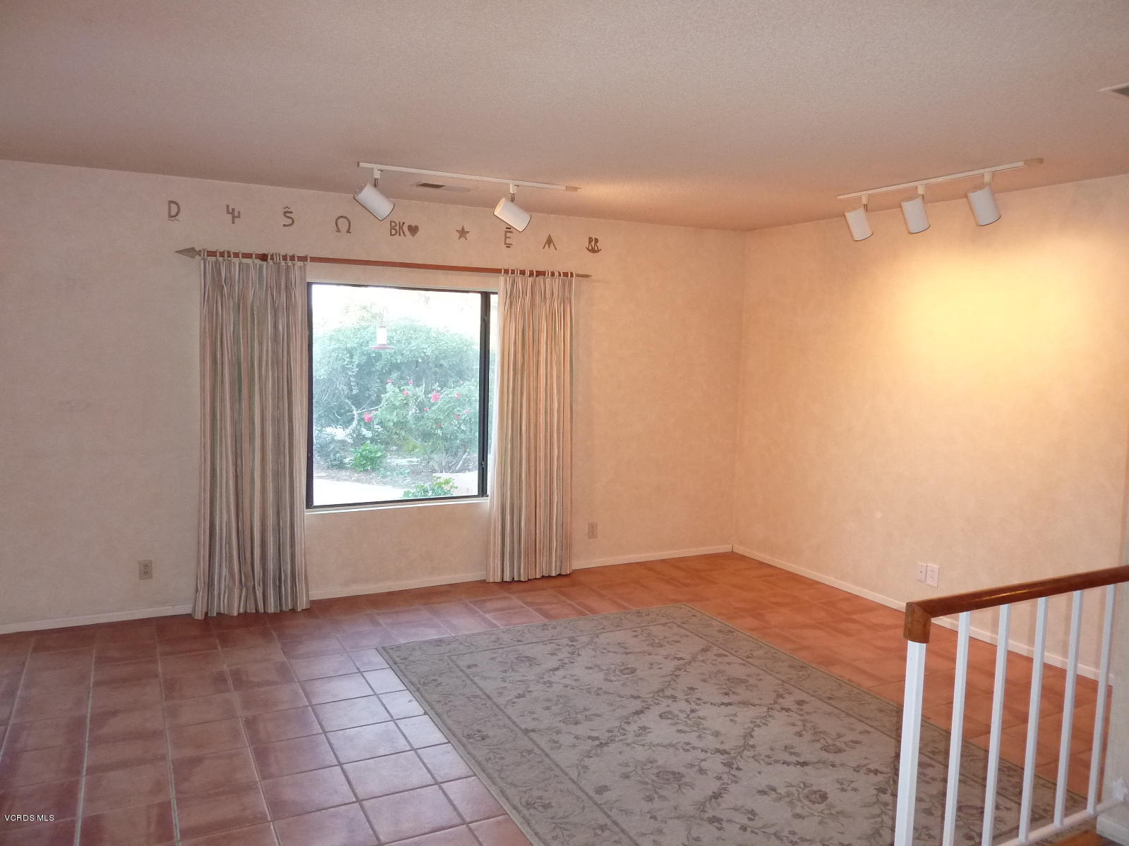 1707 Rambling Road Simi Valley, CA 93065 - Photo 17 of 29 a view of a hallway with a window