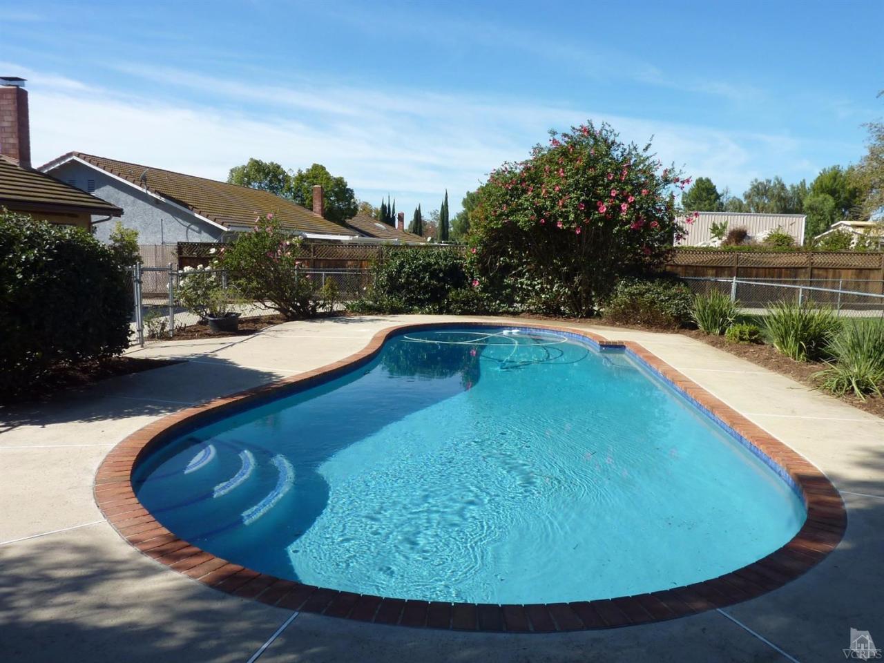 1707 Rambling Road Simi Valley, CA 93065 - Photo 3 of 29 a view of a swimming pool with an outdoor space