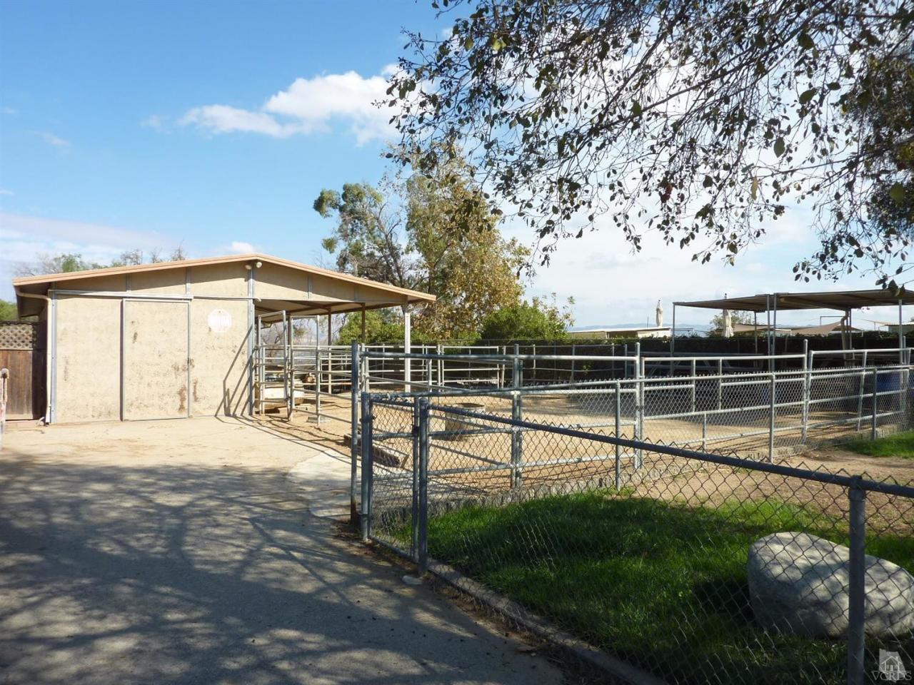 1707 Rambling Road Simi Valley, CA 93065 - Photo 21 of 29 a view of a backyard with table and chairs