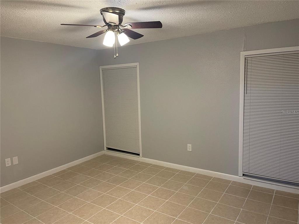 2811 Southwest Archer Road, Unit R144 Gainesville, FL 32608 - Photo 7 of 12 a view of an empty room