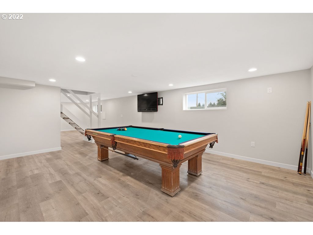 91158 Youngs River Road Astoria, OR 97103 - Photo 24 of 32 a room with wooden floor and pool table