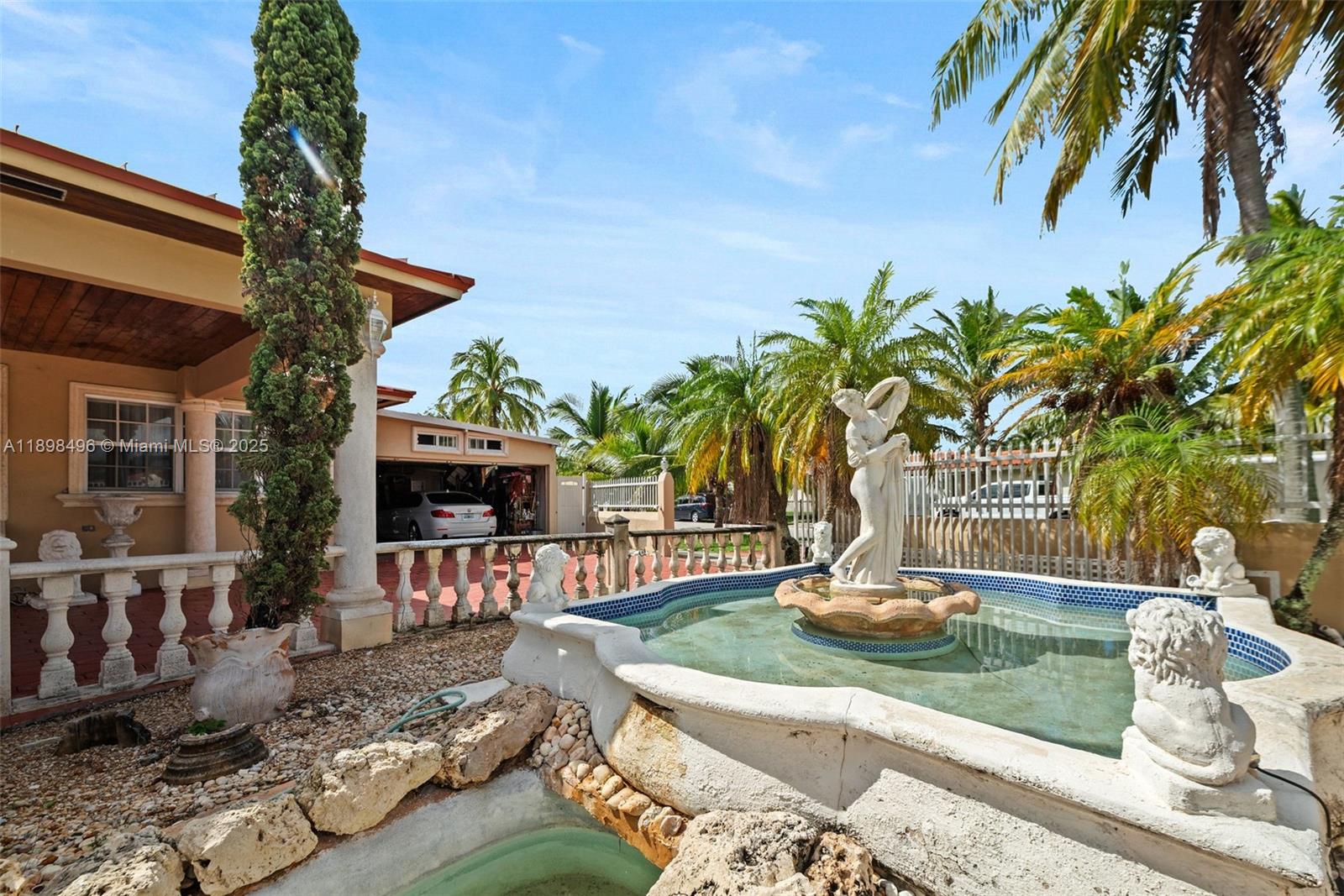 100 East 37th Street Hialeah, FL 33013 - Photo 22 of 25 a view of a house with backyard and porch