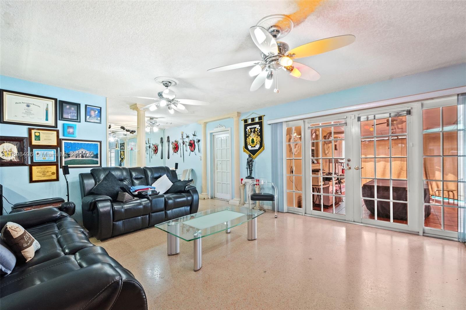 100 East 37th Street Hialeah, FL 33013 - Photo 5 of 25 a living room with furniture and decor