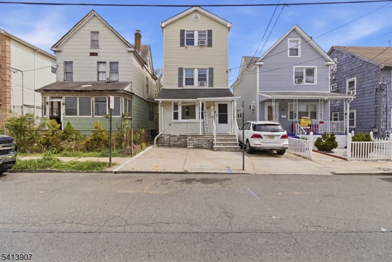 32 Cedar Avenue Elizabeth, NJ 07202 - Photo 13 of 32 a front view of residential houses