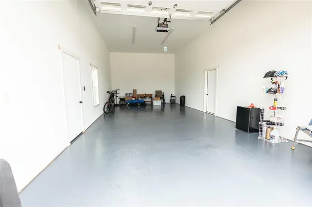 a view of garage and yard