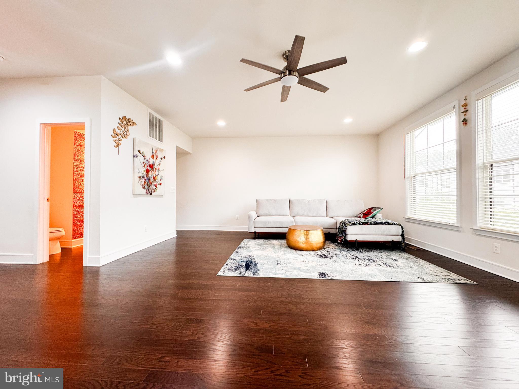 25419 Reed Orchard Terrace Chantilly, VA 20152 - Photo 15 of 47 a view of a living room and hardwood floor