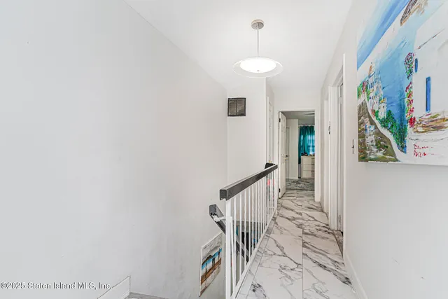 a view of entryway with stairs