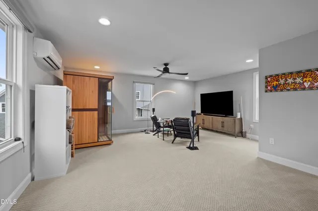 a view of a deck with wooden floor and seating space