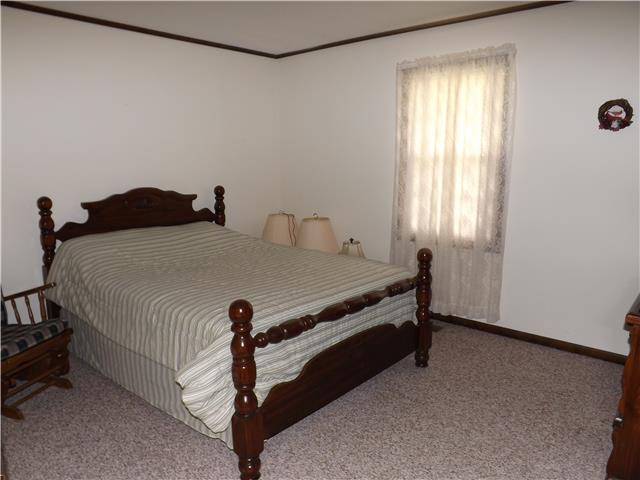 680 Maple Springs Road Manchester, TN 37355 - Photo 11 of 15 The second bedroom is a also a good size and features lots of natural lighting.