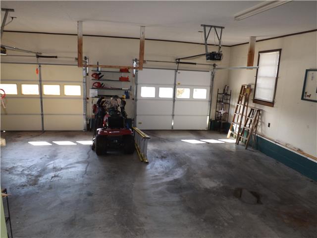 680 Maple Springs Road Manchester, TN 37355 - Photo 14 of 15 This view of the garage shows that it is a full two car garage.