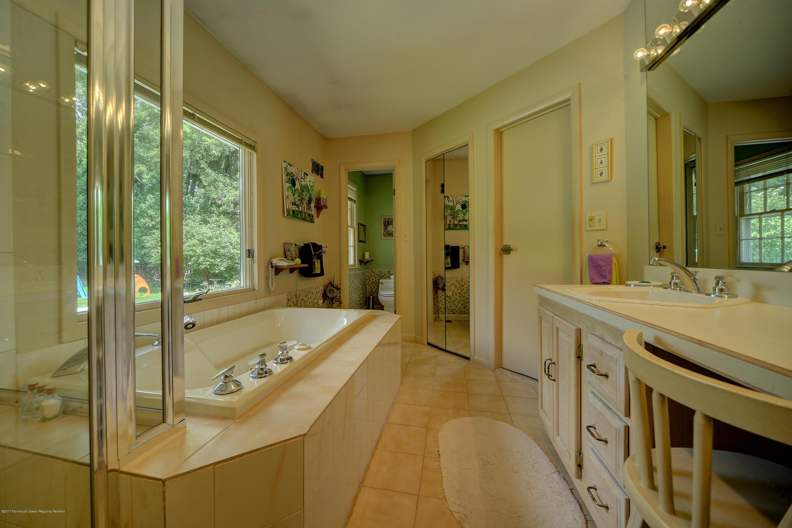 42 Strickland Road Freehold, NJ 07728 - Photo 14 of 26 Master bath w Sep powder room