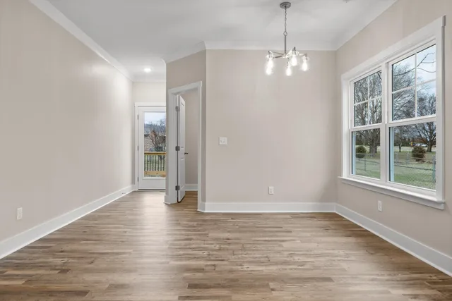 a kitchen with granite countertop a stove and a sink