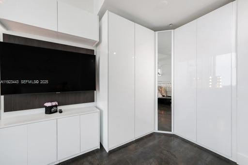 92 Southwest 3rd Street, Unit 5108 Miami, FL 33130 - Photo 14 of 23 a view of cabinets and microwave