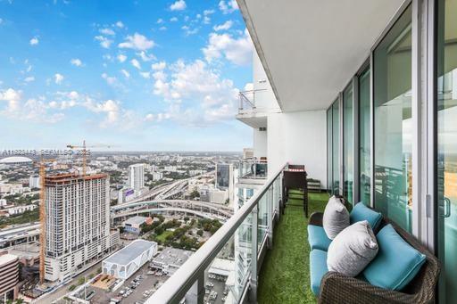 92 Southwest 3rd Street, Unit 5108 Miami, FL 33130 - Photo 10 of 23 a view of a balcony with furniture