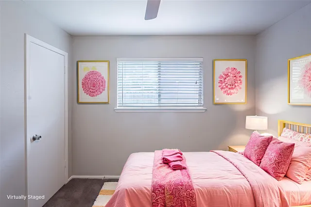wooden floor fireplace and natural light in room