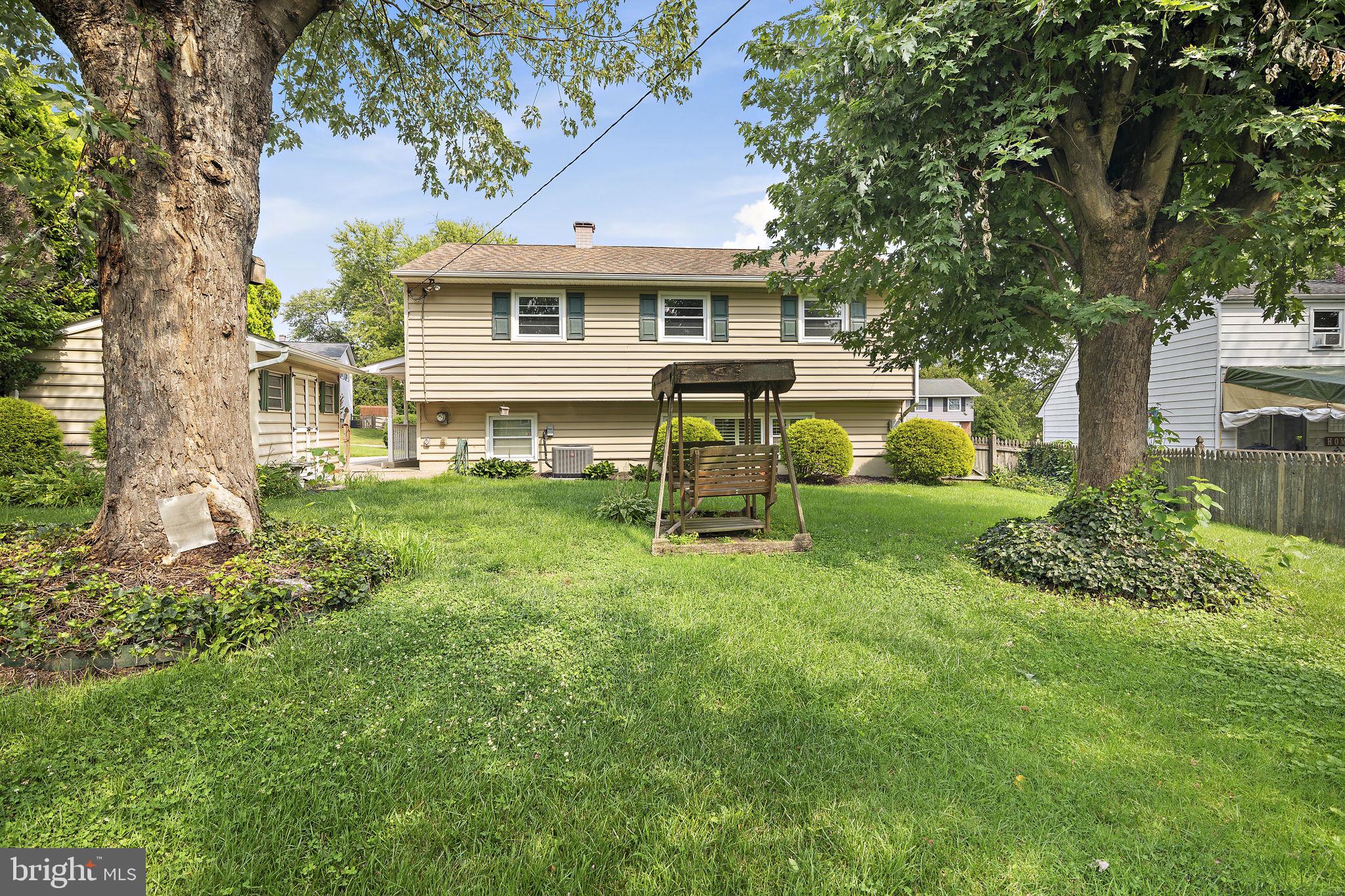 9004 Tammy Road Baltimore, MD 21236 - Photo 25 of 27 Charming backyard retreat with swing.