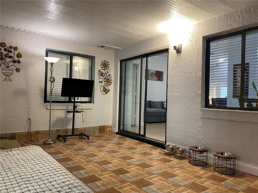 1020 Vernon Loop Oviedo, FL 32765 - Photo 30 of 34 a view of a livingroom with wooden floor and a flat screen tv