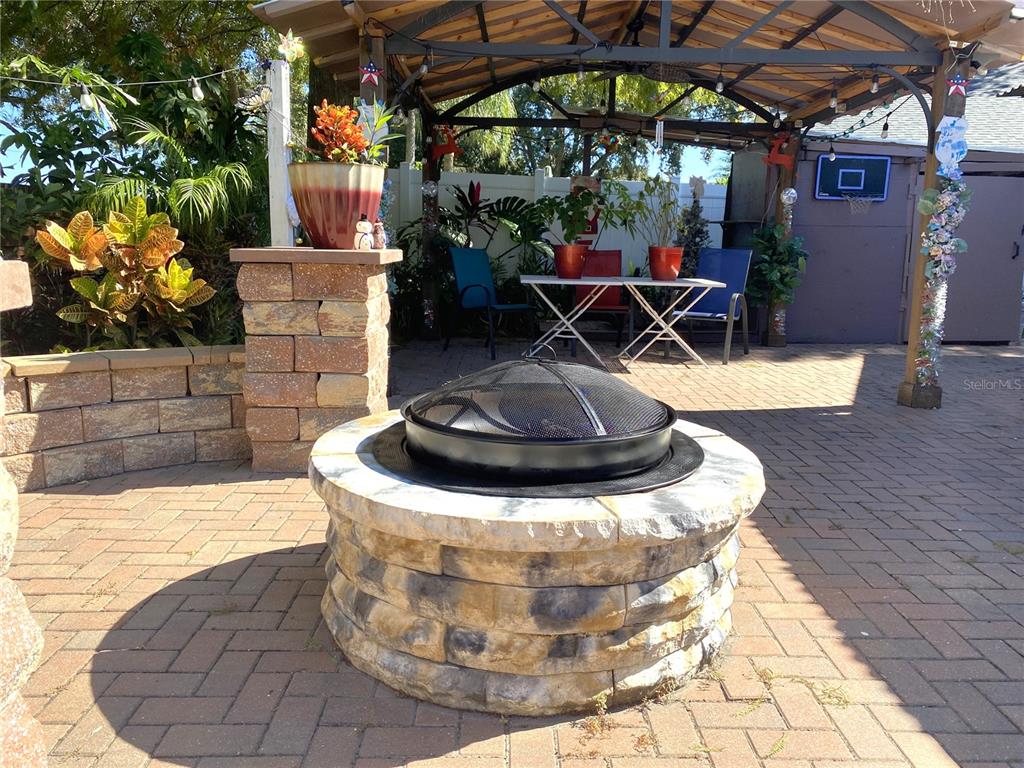 1020 Vernon Loop Oviedo, FL 32765 - Photo 31 of 34 a view of a porch with dining table and chairs