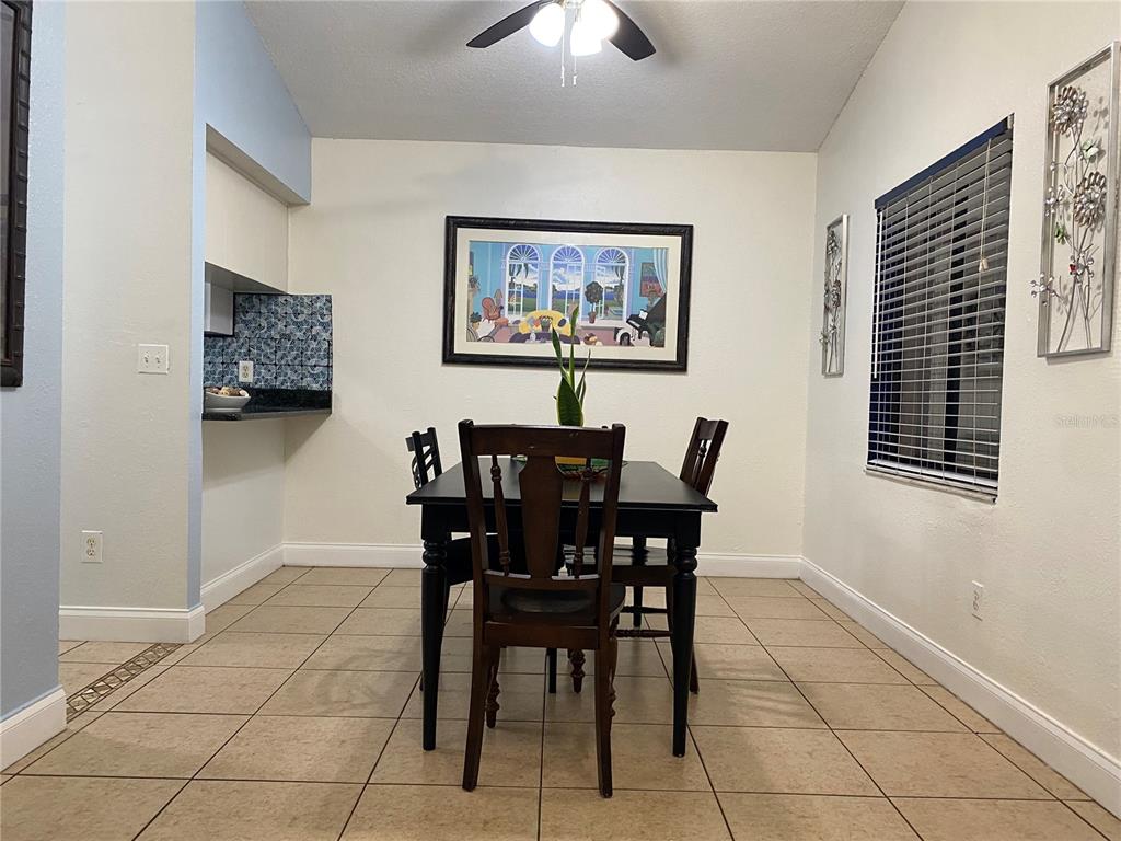 1020 Vernon Loop Oviedo, FL 32765 - Photo 8 of 34 a dining room with furniture and window