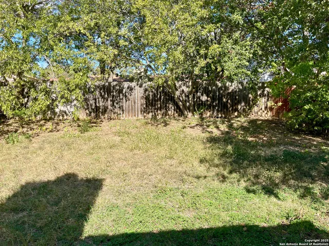 a garden view with a seating space