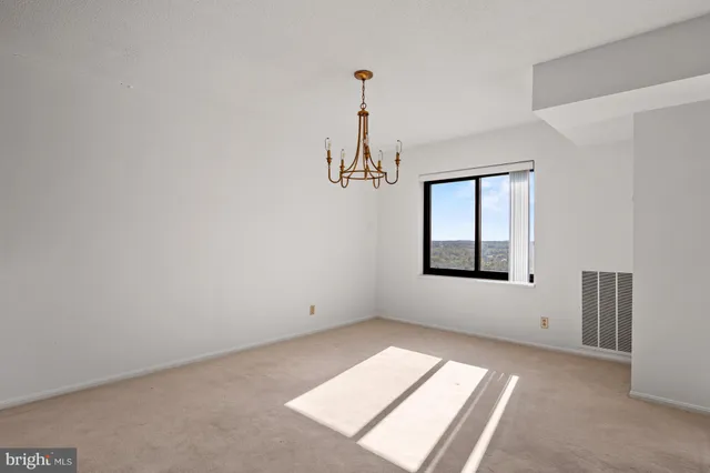 a kitchen with stainless steel appliances granite countertop a stove microwave and sink