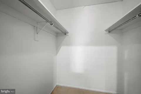 a view of a glass door and a window