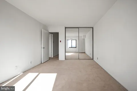 a picture of a bathroom with a shower