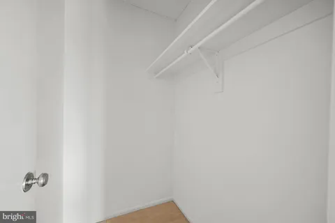 a view of swimming pool with outdoor seating and city view