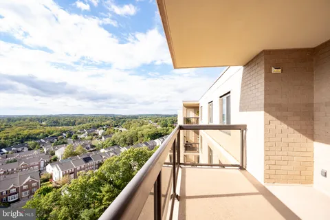 a living room with lots of furniture and a flat screen tv