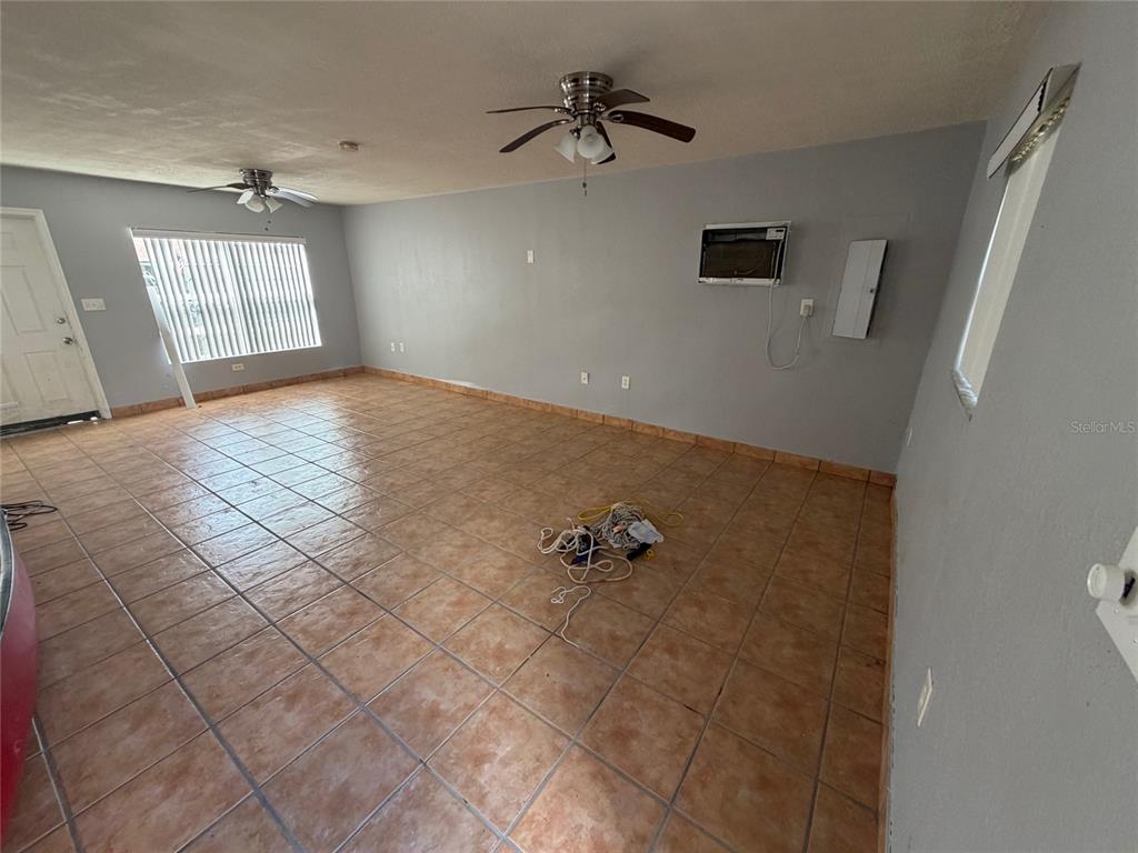 7255 Tropical Drive Weeki Wachee, FL 34607 - Photo 12 of 20 a view of an empty room with a window