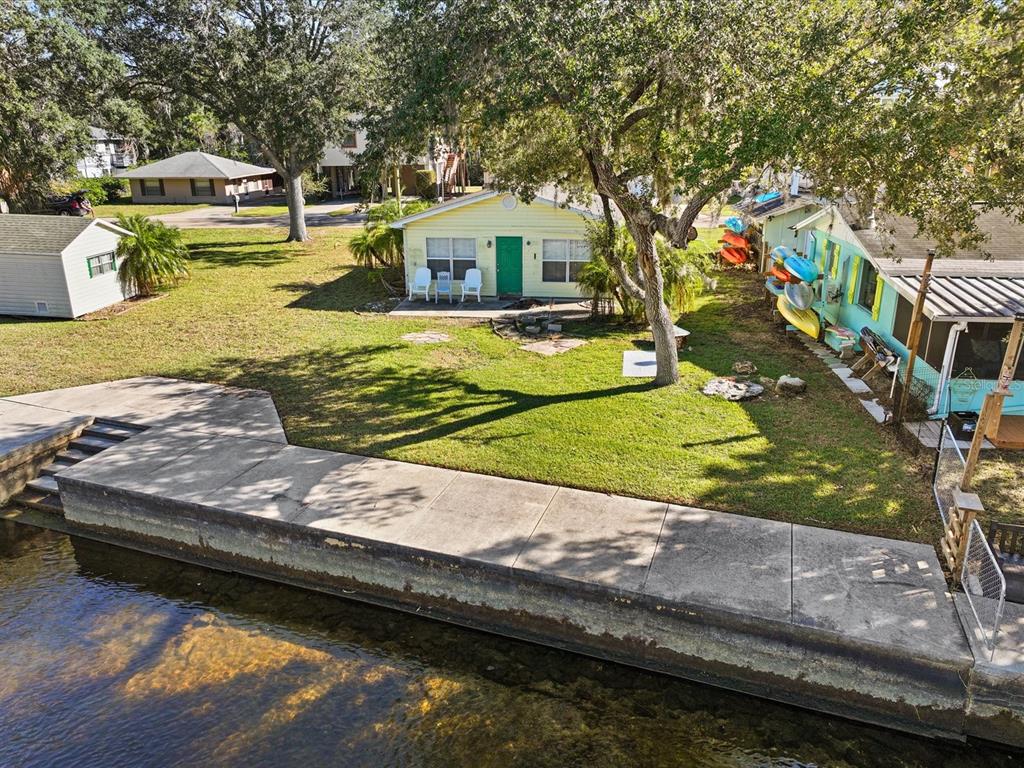 7255 Tropical Drive Weeki Wachee, FL 34607 - Photo 5 of 20 a view of a swimming pool with an outdoor space