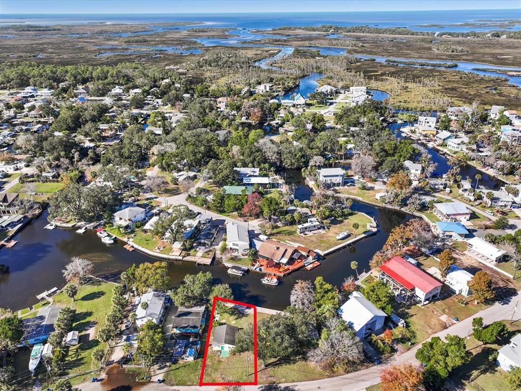 7255 Tropical Drive Weeki Wachee, FL 34607 - Photo 9 of 20 an aerial view of residential houses with outdoor space