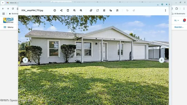 a view of a house with garden