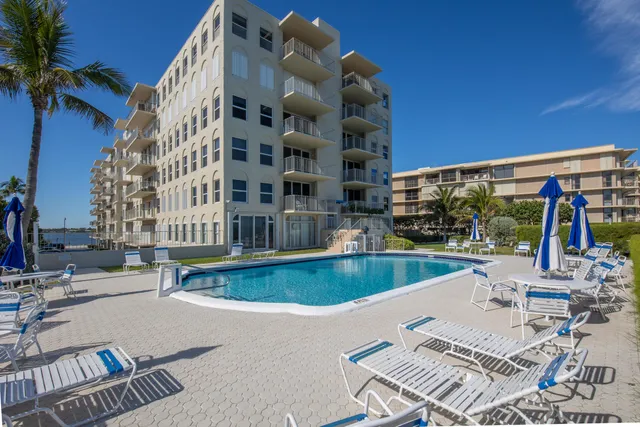 a view of pool with outdoor seating