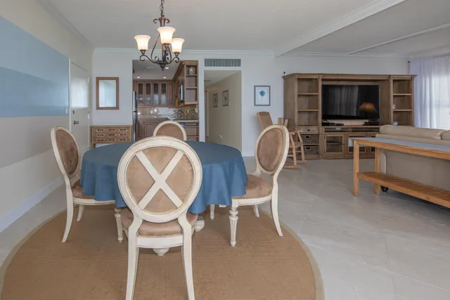 a kitchen with stainless steel appliances a refrigerator and a stove